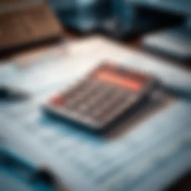 Tax Calculation and Forms Calculator and tax forms on a desk