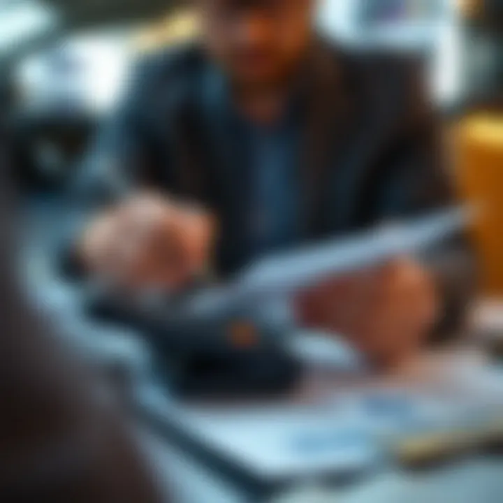 A person analyzing financial documents with a calculator